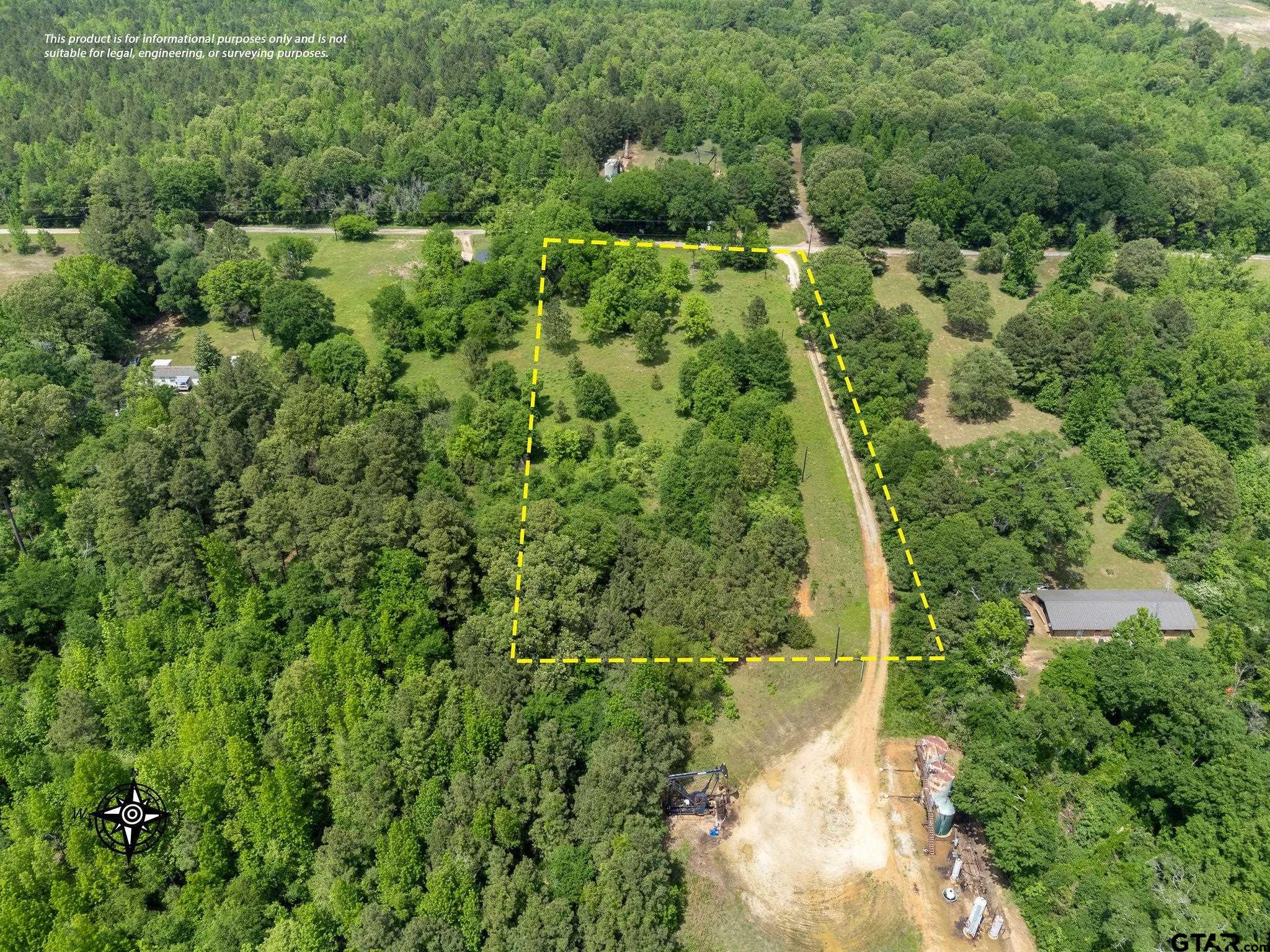 2255 Tyler Tx 75708 Tyler, TX 75708 - Photo 4 of 16 an aerial view of residential houses with outdoor space and trees