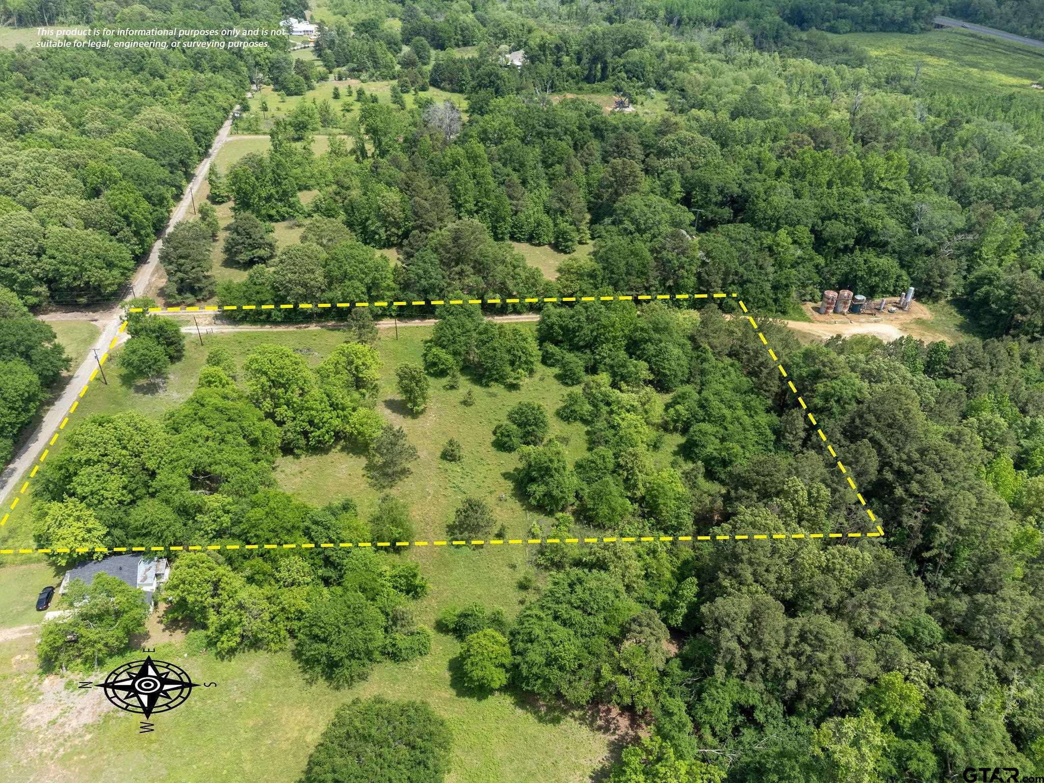 2255 Tyler Tx 75708 Tyler, TX 75708 - Photo 5 of 16 an aerial view of residential houses with outdoor space and trees