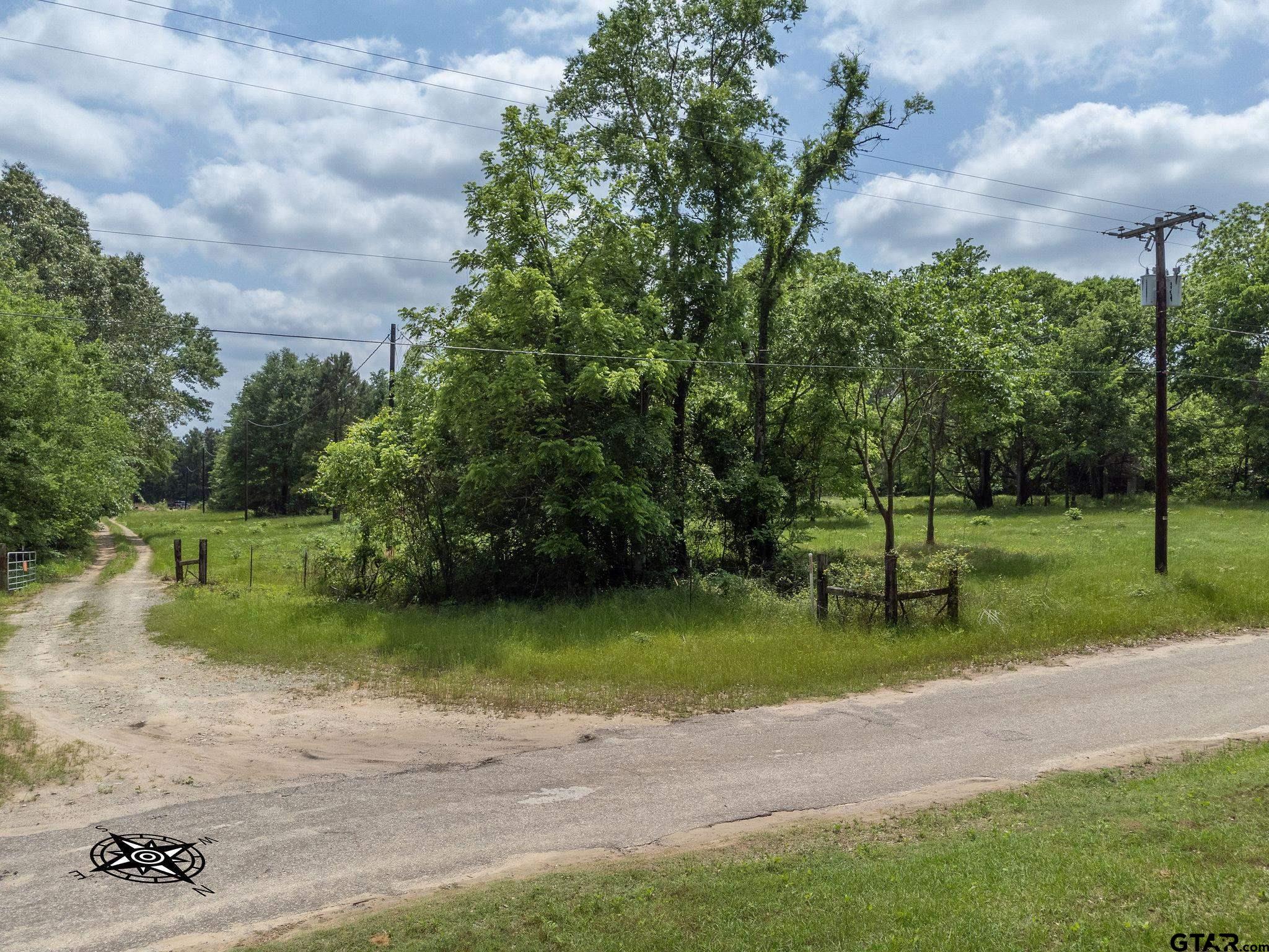 2255 Tyler Tx 75708 Tyler, TX 75708 - Photo 7 of 16 a view of a park with plants and large trees