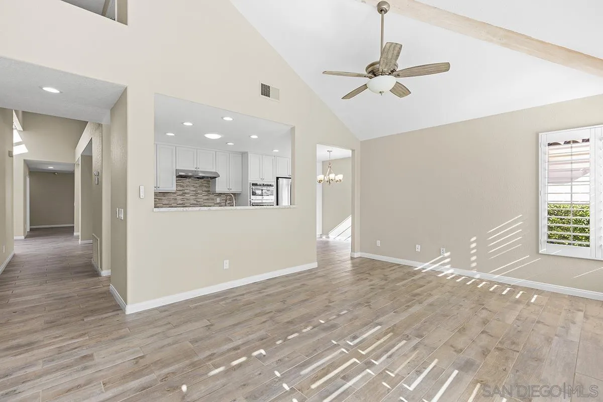 12071 Caminito Corriente San Diego, CA 92128 - Photo 20 of 51 a view of a kitchen with a sink and a window