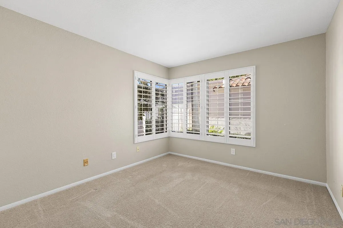 12071 Caminito Corriente San Diego, CA 92128 - Photo 29 of 51 a view of an empty room with a window