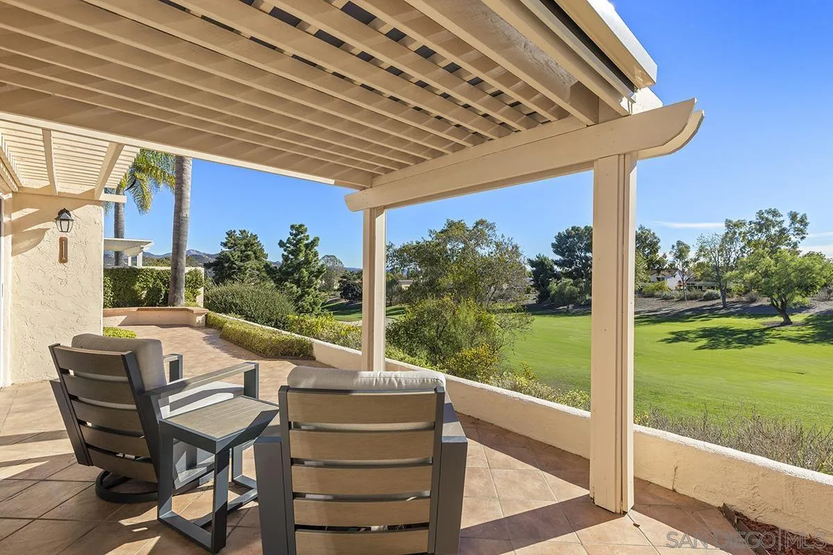 12071 Caminito Corriente San Diego, CA 92128 - Photo 35 of 51 a patio with table and chairs
