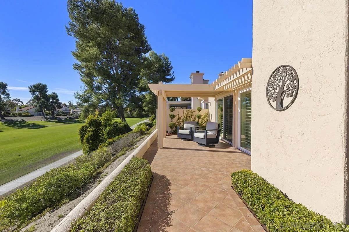 12071 Caminito Corriente San Diego, CA 92128 - Photo 37 of 51 a view of a porch with furniture and garden