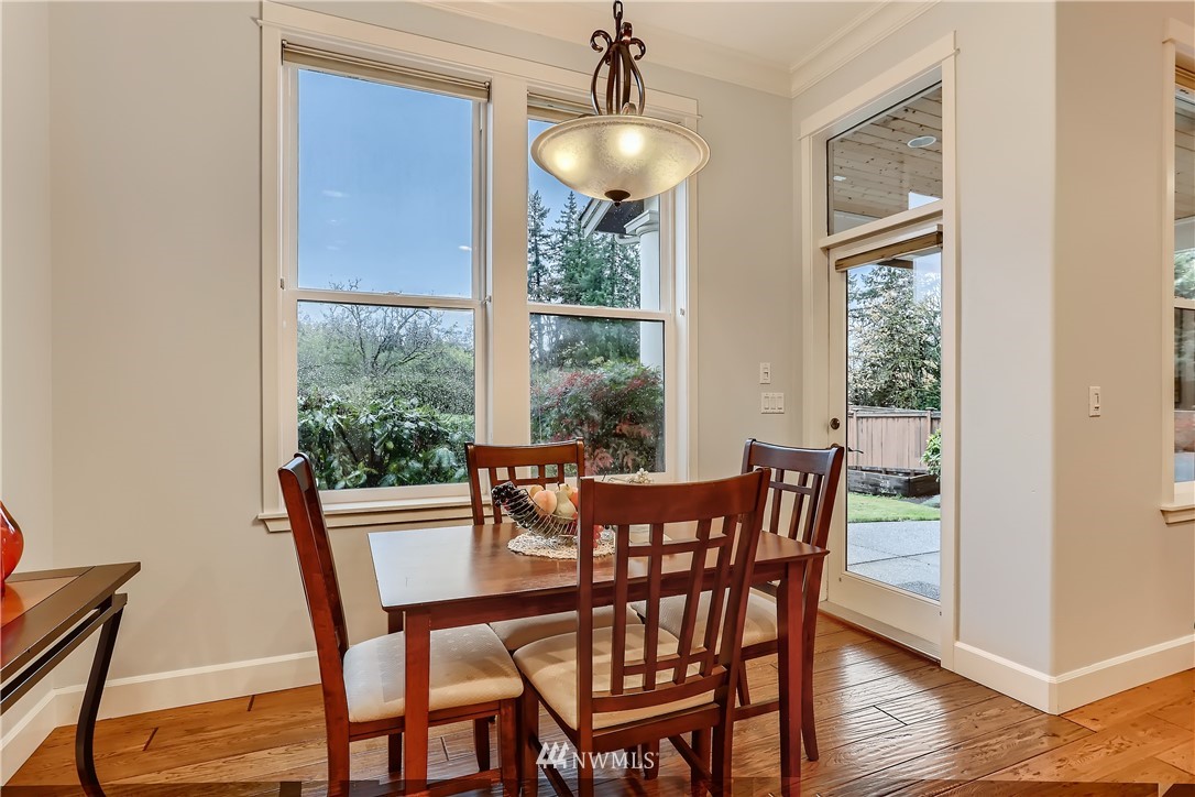 905 South 38th Court Renton, WA 98055 - Photo 17 of 33 a view of a dining room with furniture window and outside view