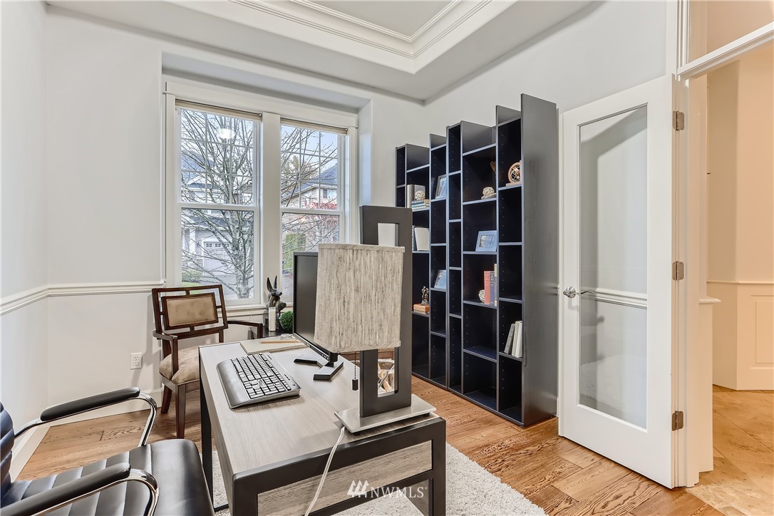 905 South 38th Court Renton, WA 98055 - Photo 6 of 33 a view of a workspace with furniture and a window