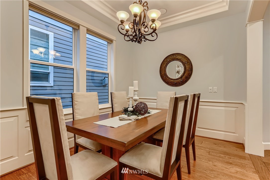 905 South 38th Court Renton, WA 98055 - Photo 7 of 33 a view of a dining room with furniture and window