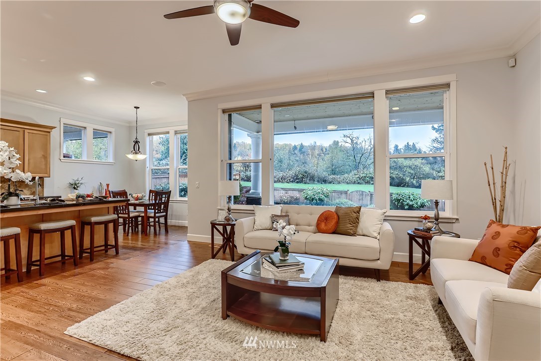 905 South 38th Court Renton, WA 98055 - Photo 8 of 33 a living room with furniture and a large window