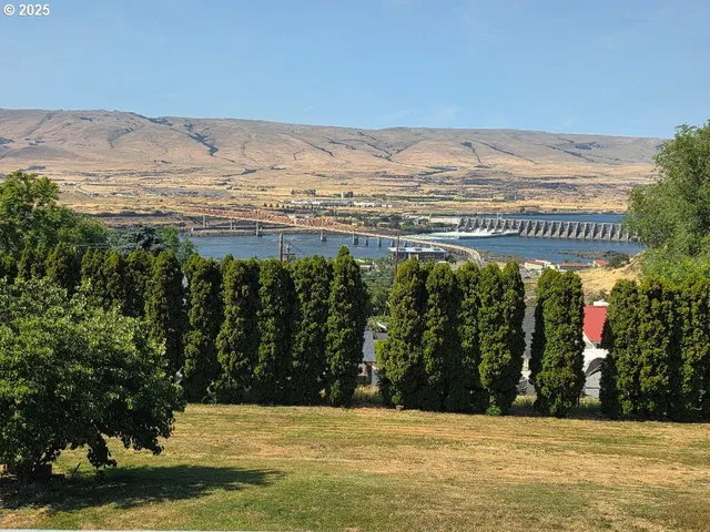 a view of balcony with wooden floor