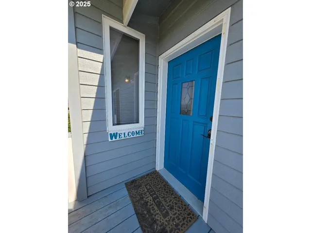 a view of a swimming pool with a yard