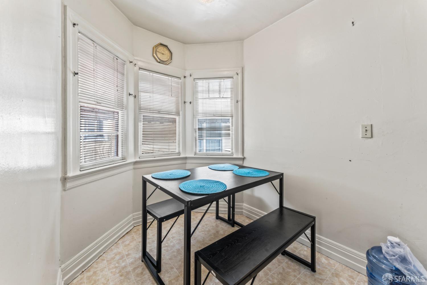 1646 Parker Street Berkeley, CA 94703 - Photo 14 of 33 a dining room with furniture and a window