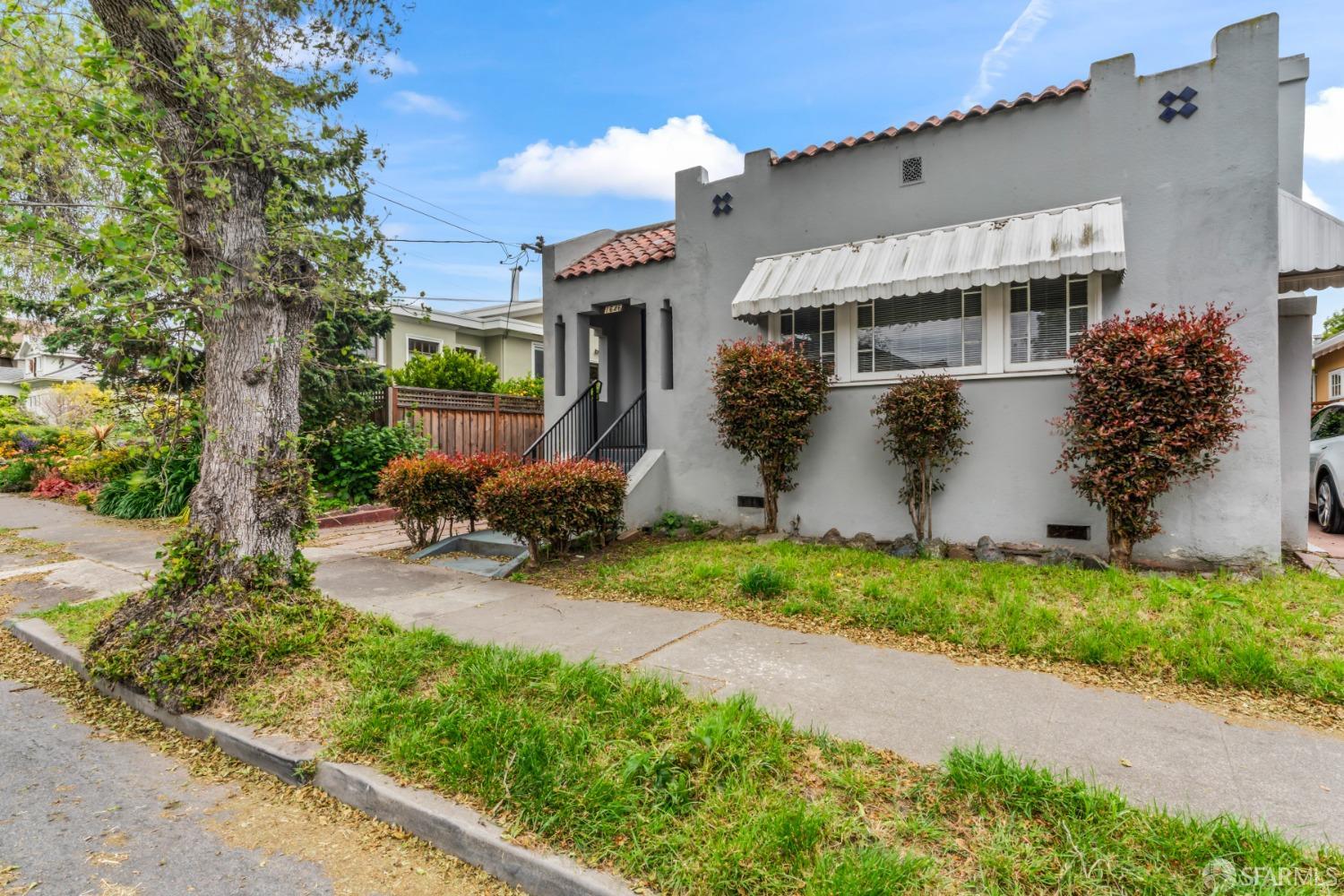 1646 Parker Street Berkeley, CA 94703 - Photo 2 of 33 a view of a house with backyard and garden