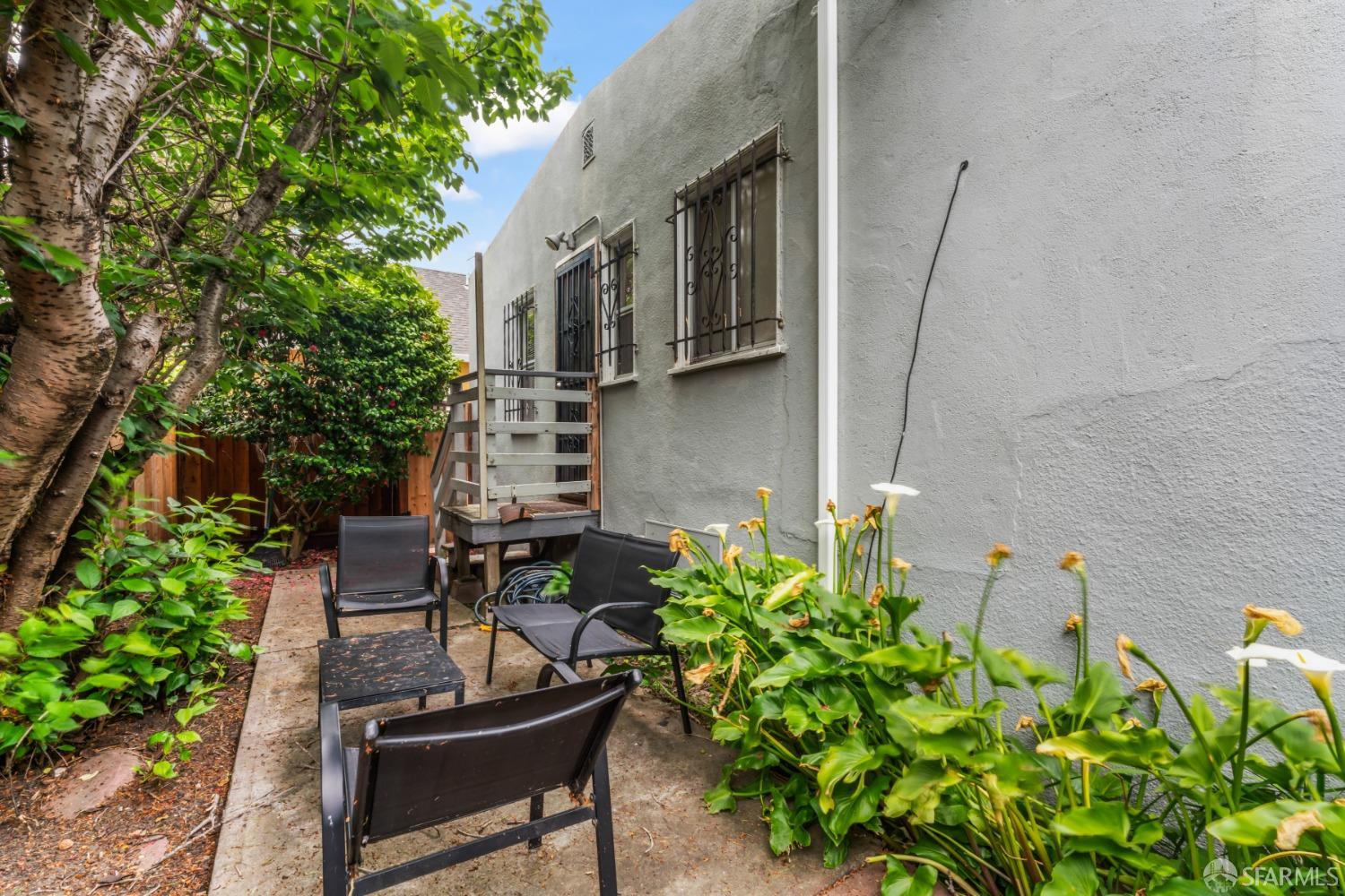 1646 Parker Street Berkeley, CA 94703 - Photo 25 of 33 a backyard of a house with outdoor seating