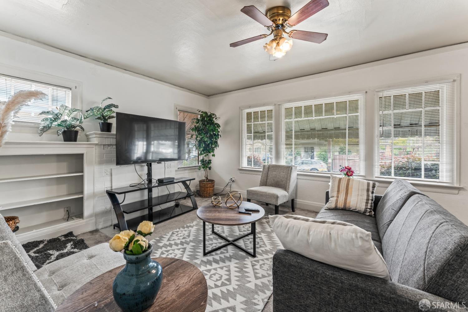 1646 Parker Street Berkeley, CA 94703 - Photo 5 of 33 a living room with furniture and a window