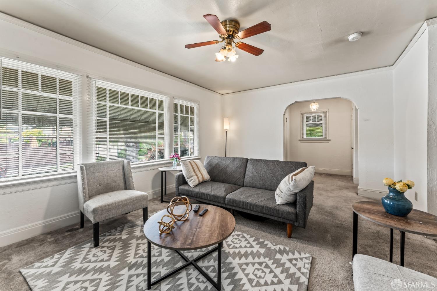 1646 Parker Street Berkeley, CA 94703 - Photo 6 of 33 a living room with furniture and a large window