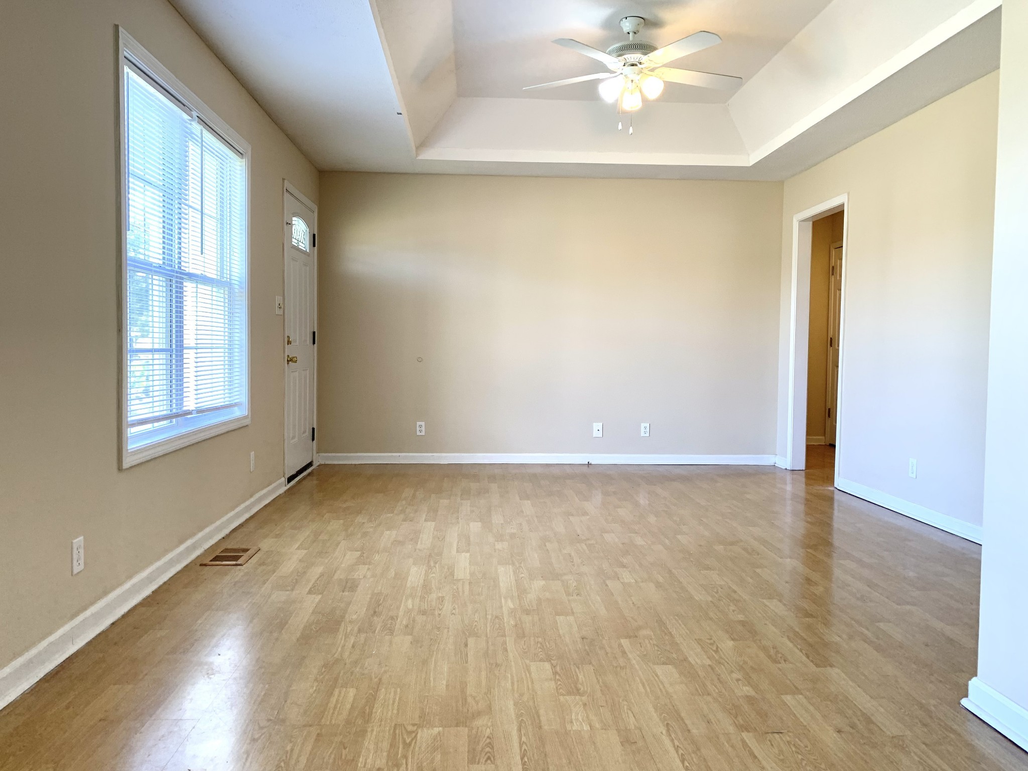 1024 Poppy Seed Drive Oak Grove, KY 42262 - Photo 2 of 21 wooden floor in an empty room with a window