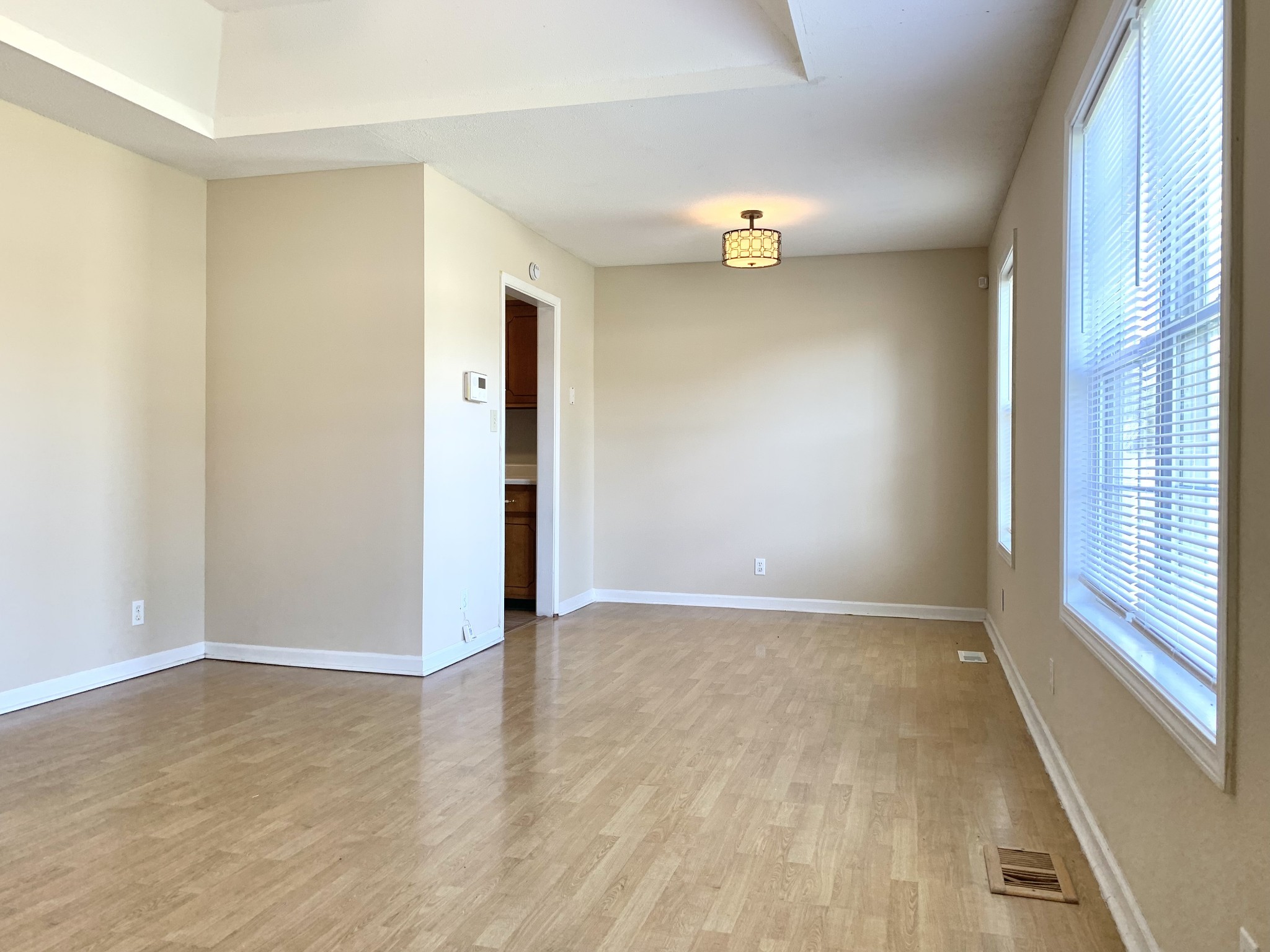 1024 Poppy Seed Drive Oak Grove, KY 42262 - Photo 3 of 21 wooden floor in an empty room with a window