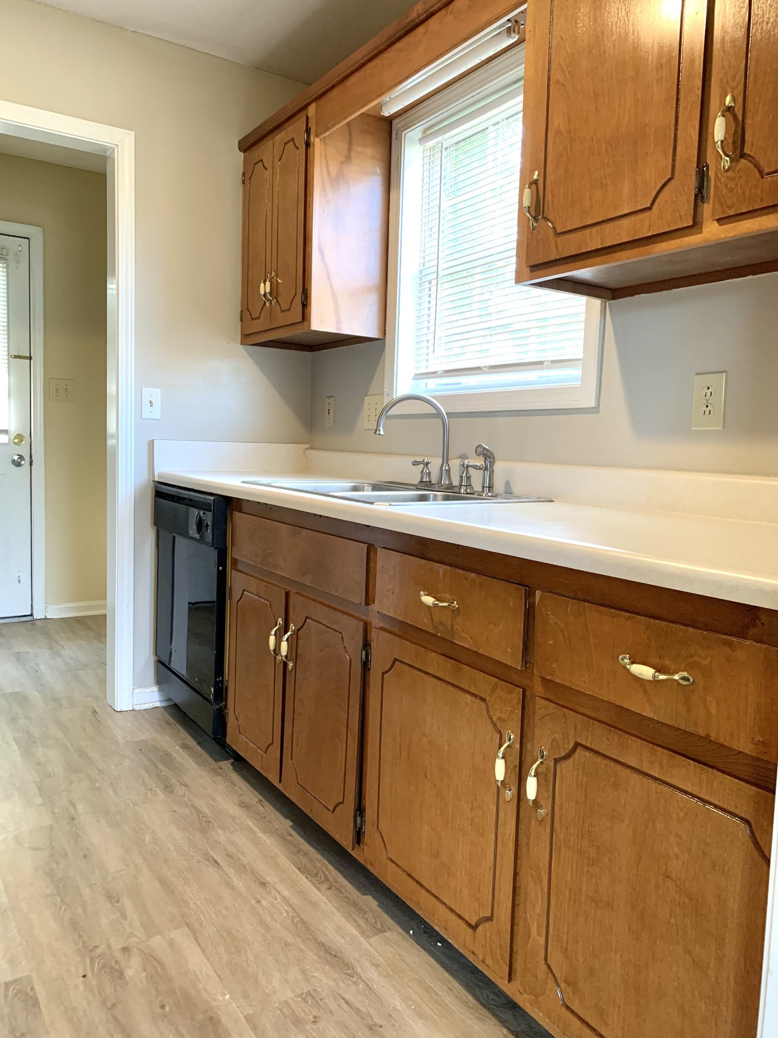 1024 Poppy Seed Drive Oak Grove, KY 42262 - Photo 4 of 21 a kitchen with granite countertop cabinets stainless steel appliances and a sink