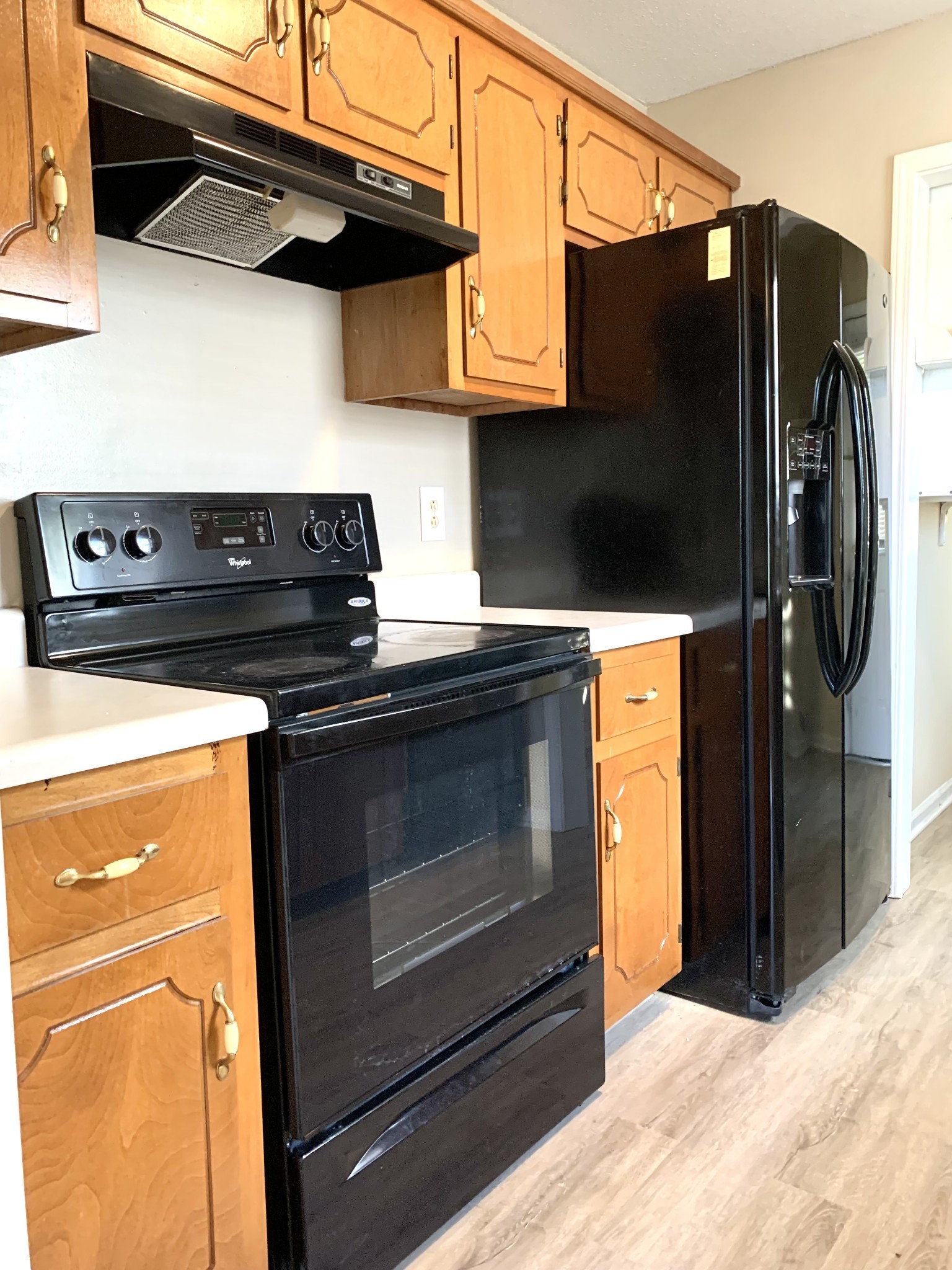 1024 Poppy Seed Drive Oak Grove, KY 42262 - Photo 5 of 21 a kitchen with stainless steel appliances granite countertop a stove and a refrigerator