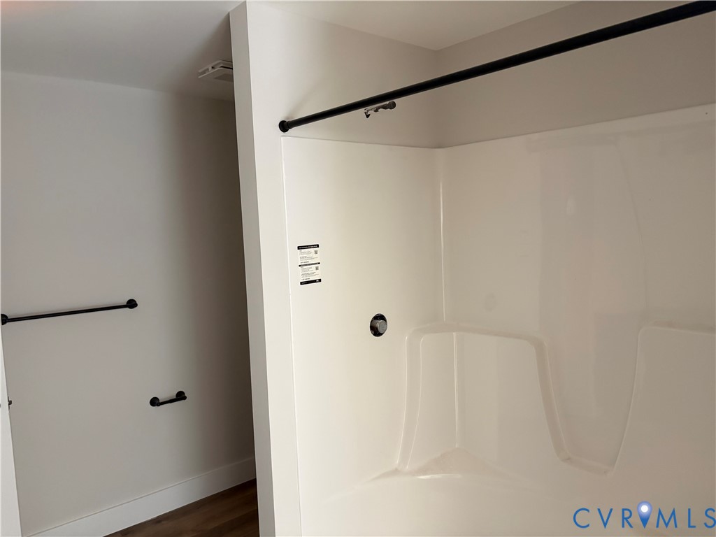 15135 Lebanon Road Spring Grove, VA 23881 - Photo 4 of 19 White fiberglass shower enclosure with an integrat