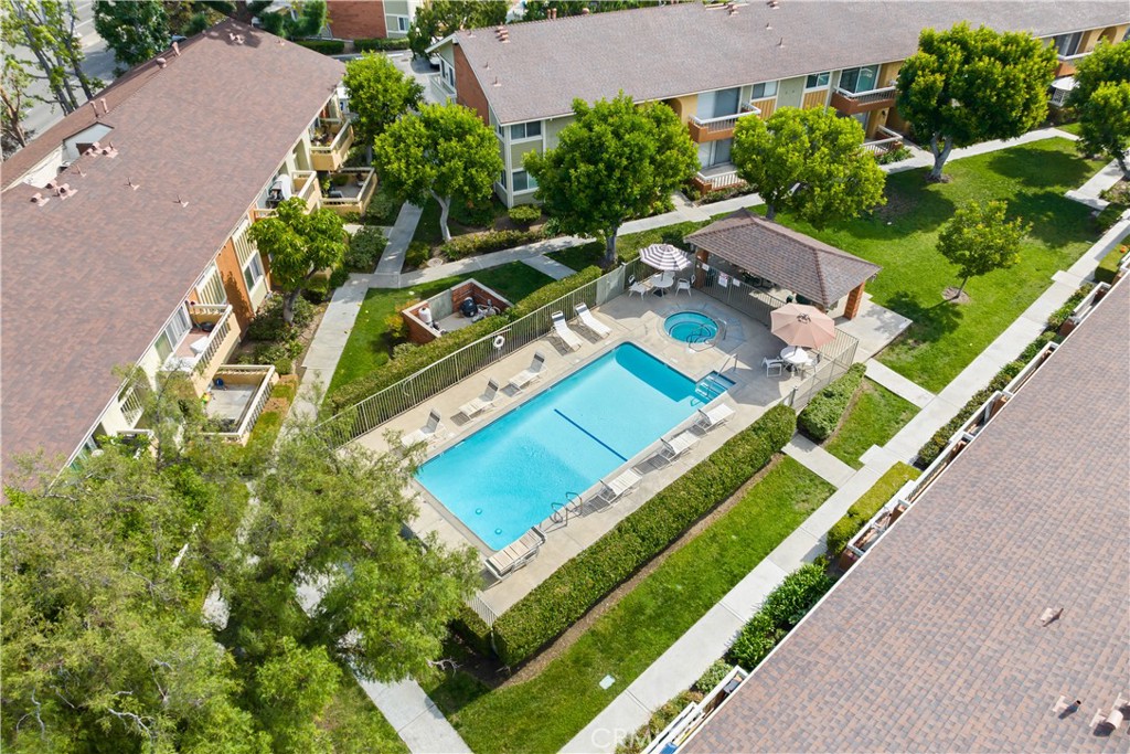 Summer Woods lush community with two pools, spa and picnic areas throughout