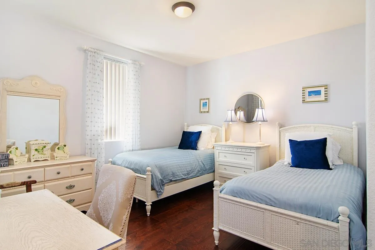 Undisclosed Address San Diego, CA 92130 - Photo 14 of 28 a bedroom with two beds and a dresser