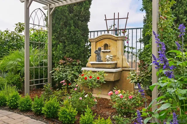 a view of statue in a garden