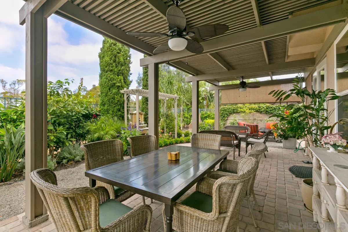 Undisclosed Address San Diego, CA 92130 - Photo 24 of 28 a view of a patio with a table chairs and a patio