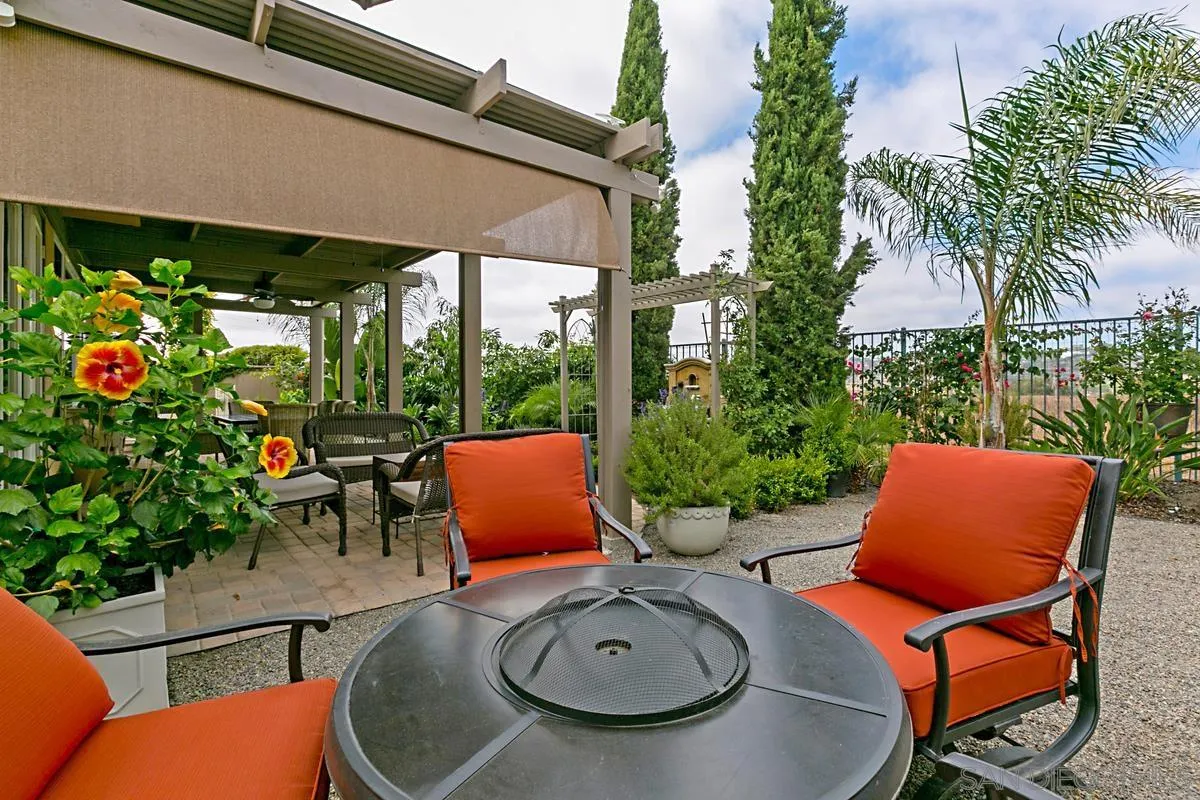 Undisclosed Address San Diego, CA 92130 - Photo 26 of 28 an outdoor sitting area with furniture and garden