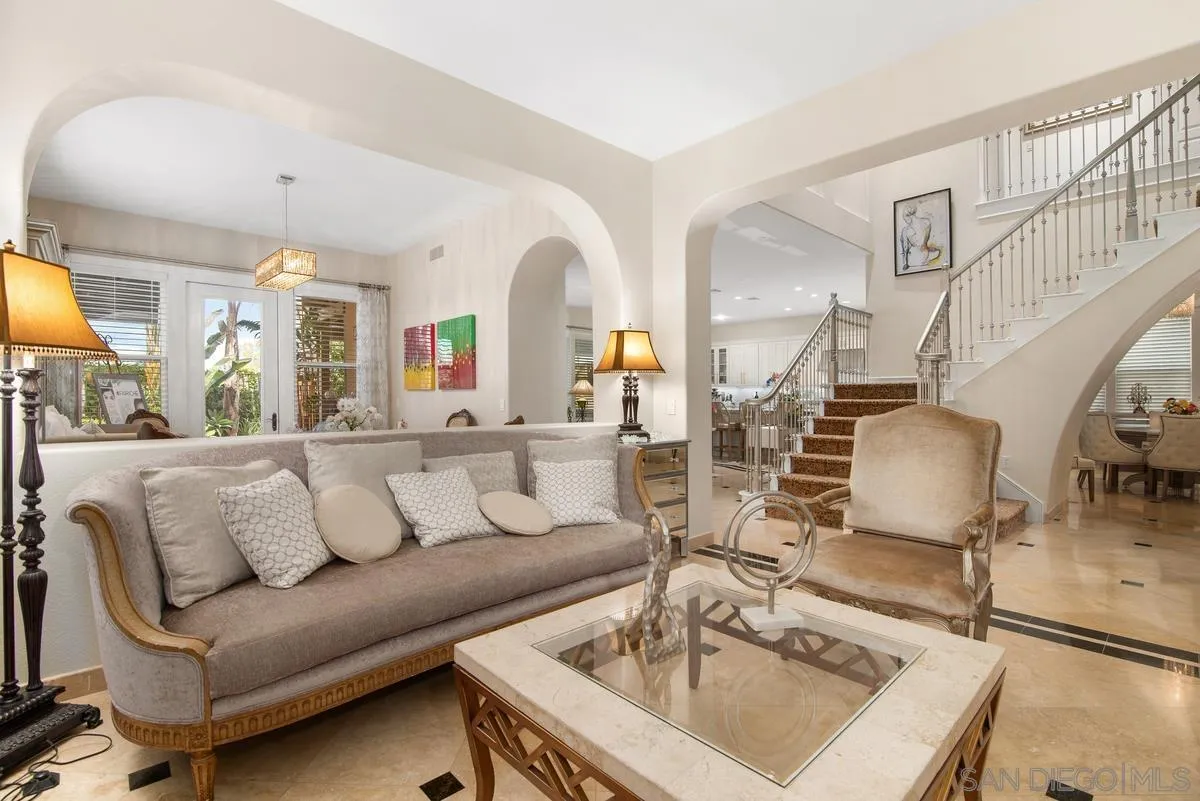 Undisclosed Address San Diego, CA 92130 - Photo 4 of 28 a living room with furniture and a chandelier