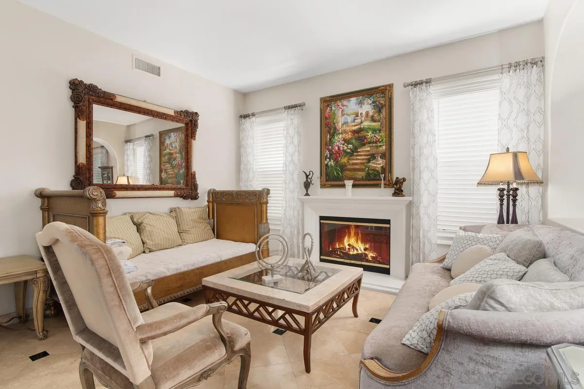 Undisclosed Address San Diego, CA 92130 - Photo 5 of 28 a living room with furniture and a fireplace