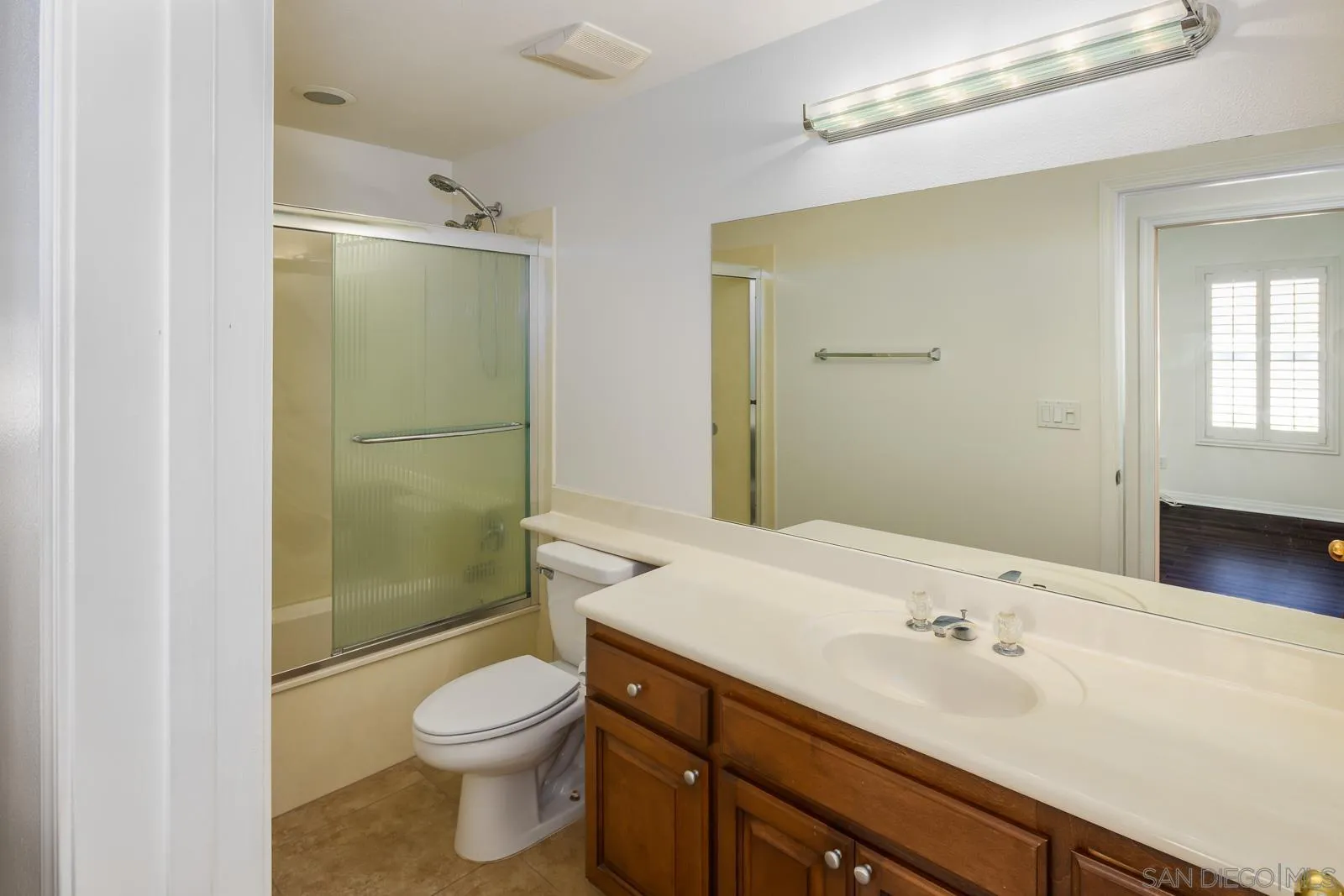 828 D Coronado, CA 92118 - Photo 20 of 24 a bathroom with a sink a toilet and shower