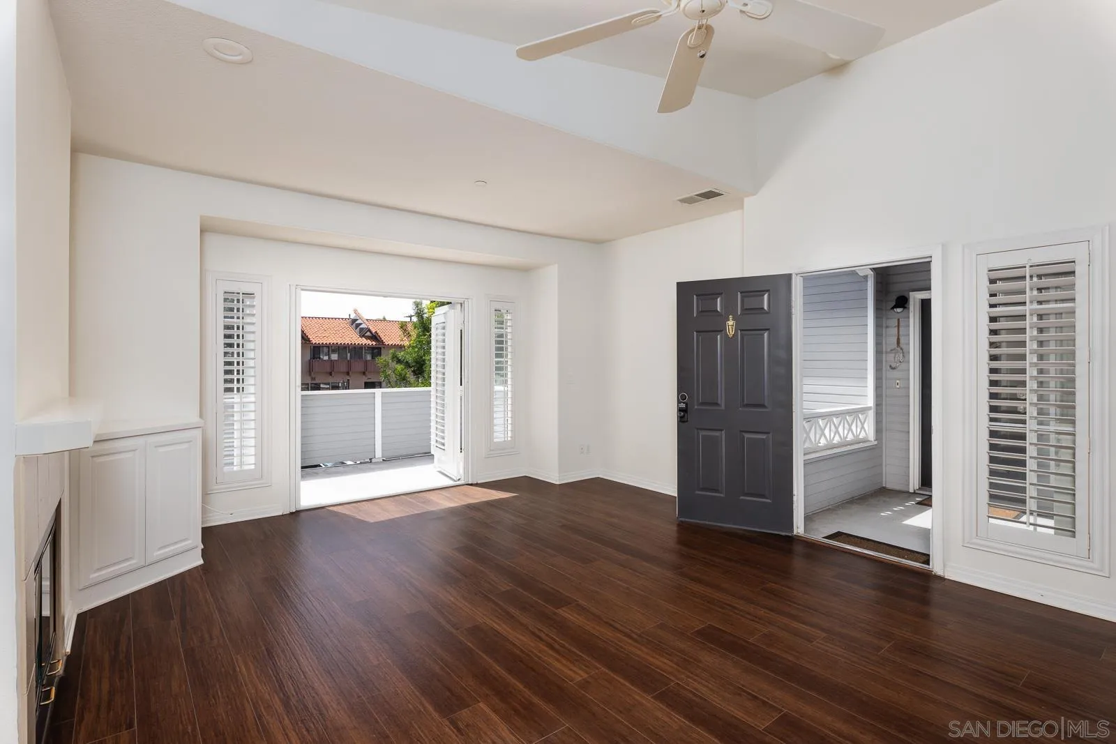828 D Coronado, CA 92118 - Photo 5 of 24 an empty room with wooden floor and windows