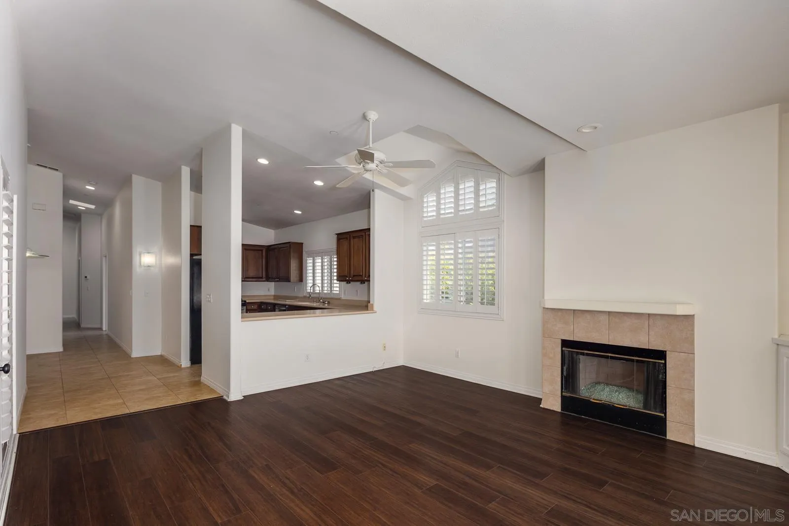 828 D Coronado, CA 92118 - Photo 6 of 24 a view of an empty room with wooden floor and a window