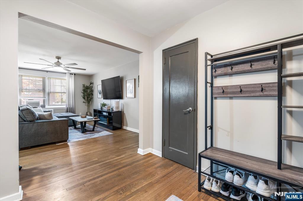 126 Hackett Place, Unit 101A Rutherford, NJ 07070 - Photo 3 of 22 a living room with furniture and a window
