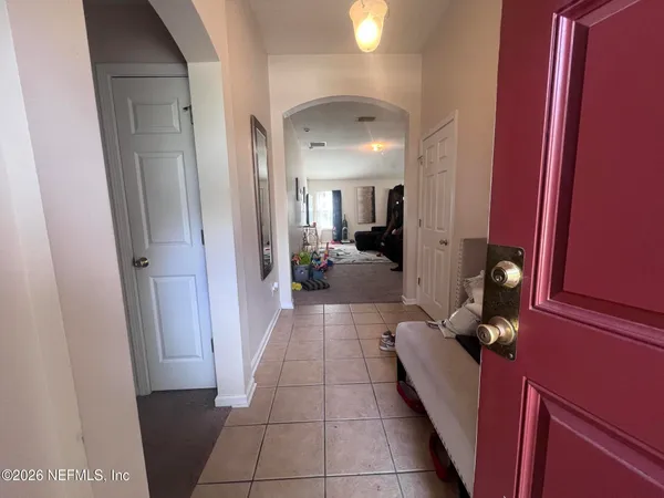 a bathroom with a mirror and a shower
