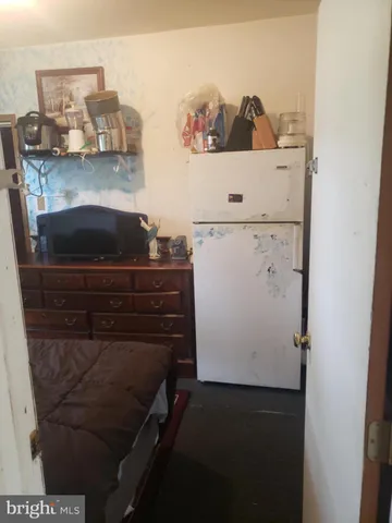 a view of dresser and workspace