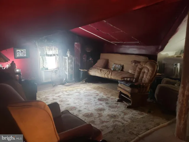 a room with furniture and window