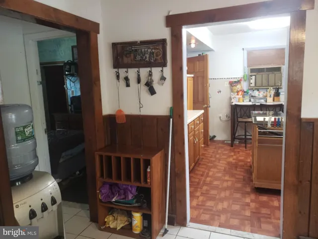 a kitchen with a sink stove and refrigerator