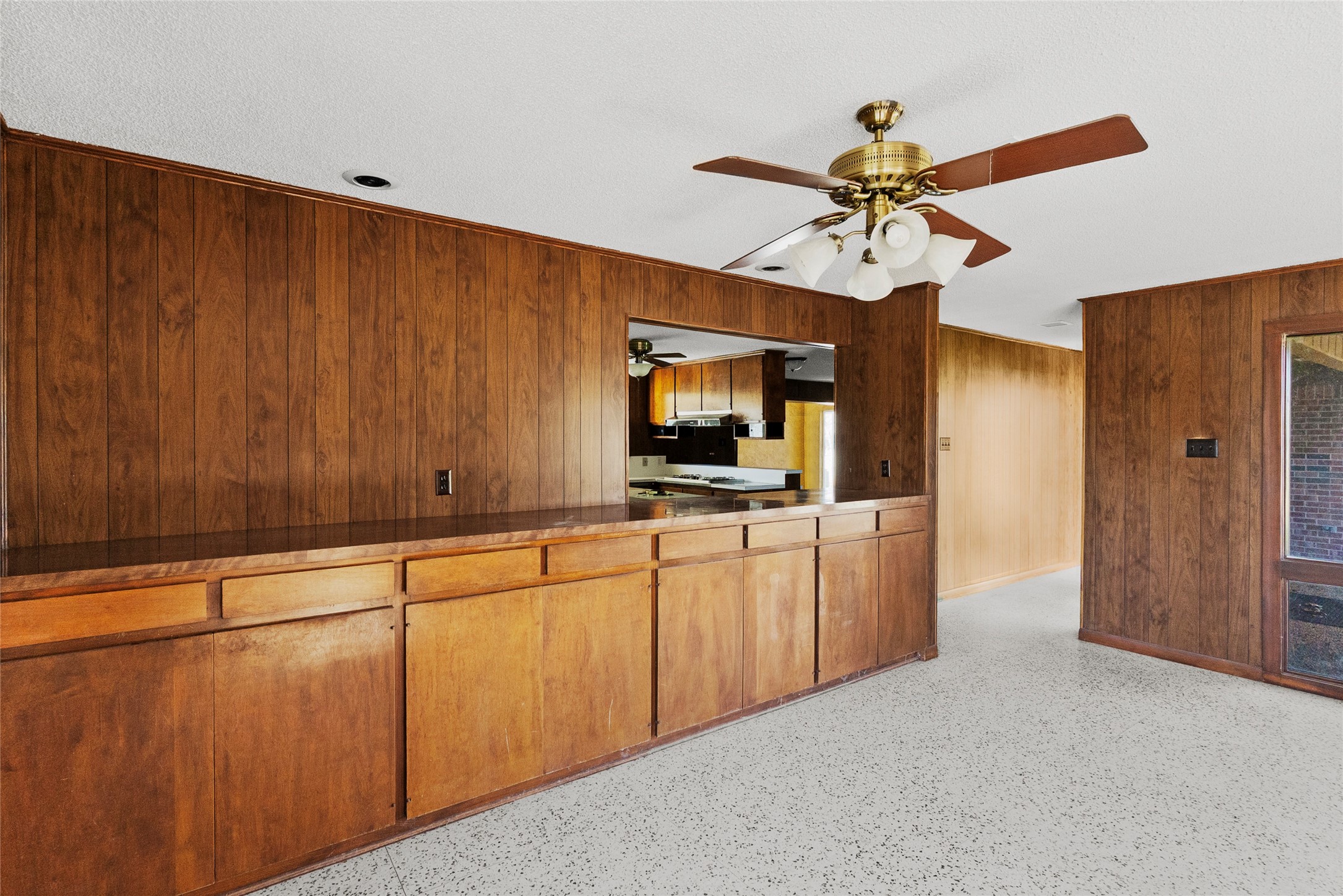 16121 Fm 2620 Road Bedias, TX 77831 - Photo 13 of 28 a kitchen with white cabinets and stainless steel appliances