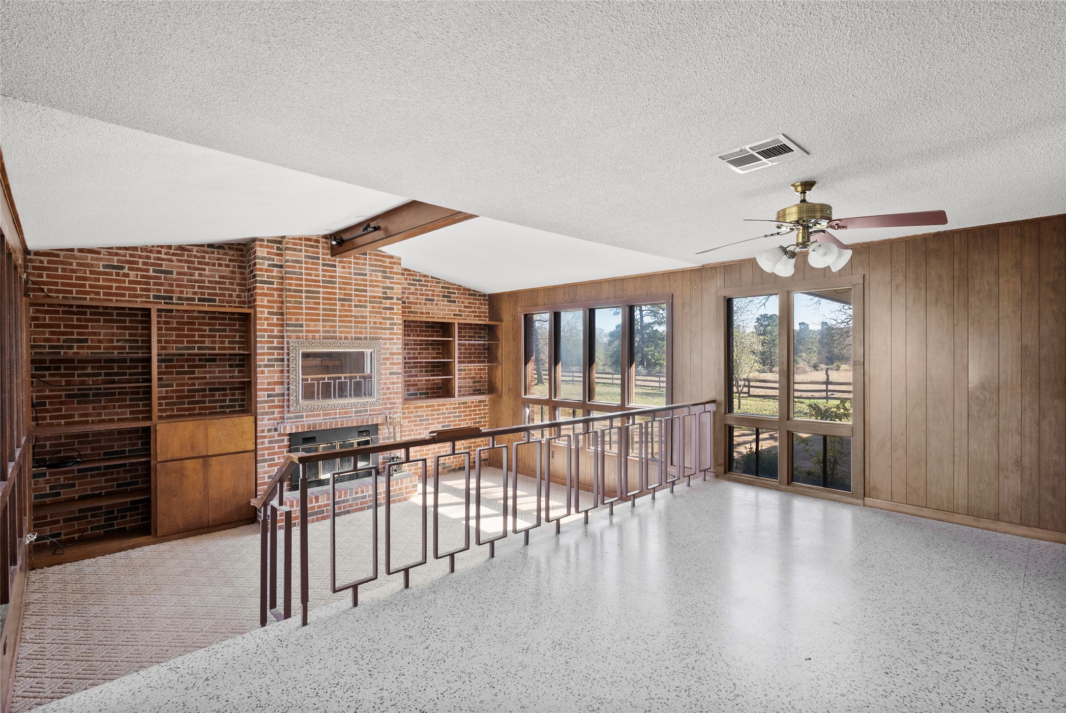 16121 Fm 2620 Road Bedias, TX 77831 - Photo 2 of 28 wooden floor in an empty room with a window
