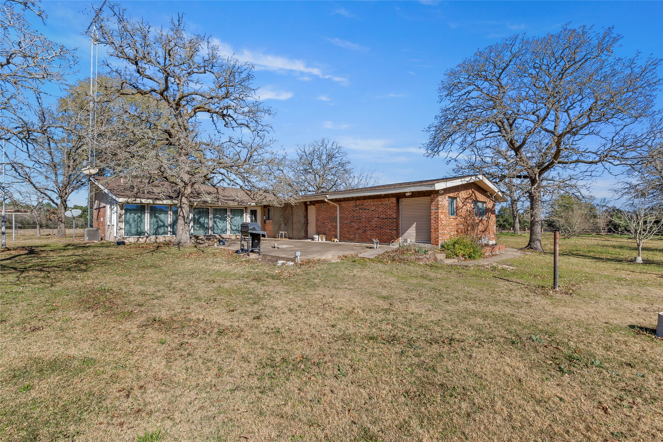 16121 Fm 2620 Road Bedias, TX 77831 - Photo 26 of 28 a backyard of a house
