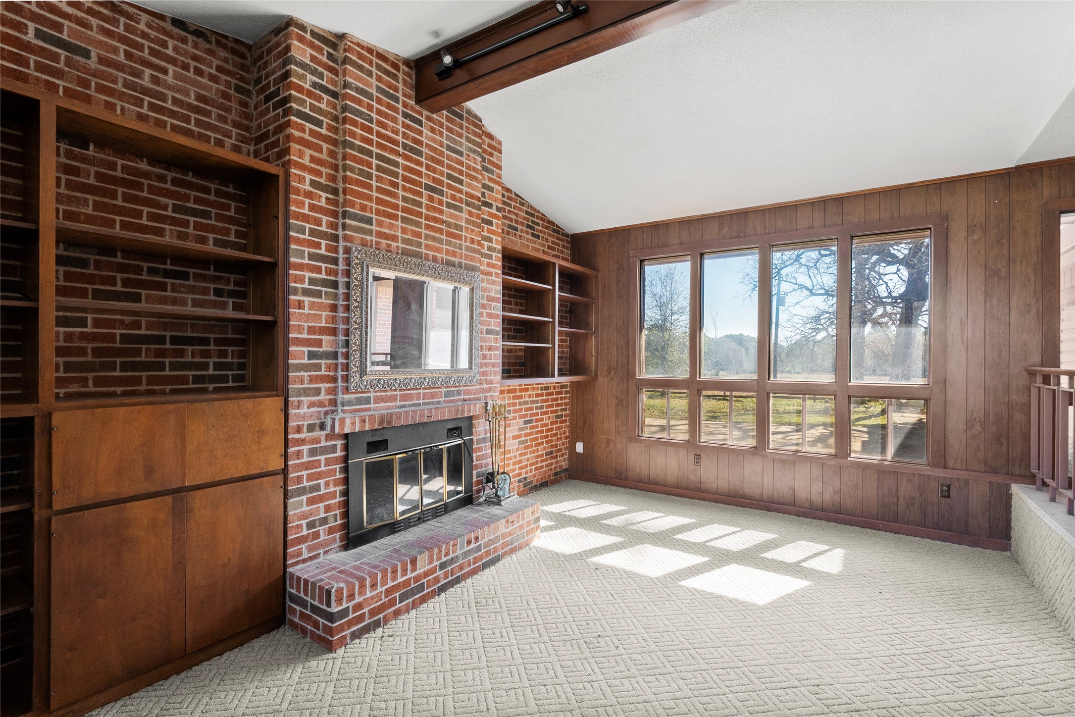 16121 Fm 2620 Road Bedias, TX 77831 - Photo 5 of 28 a view of livingroom with furniture and fireplace