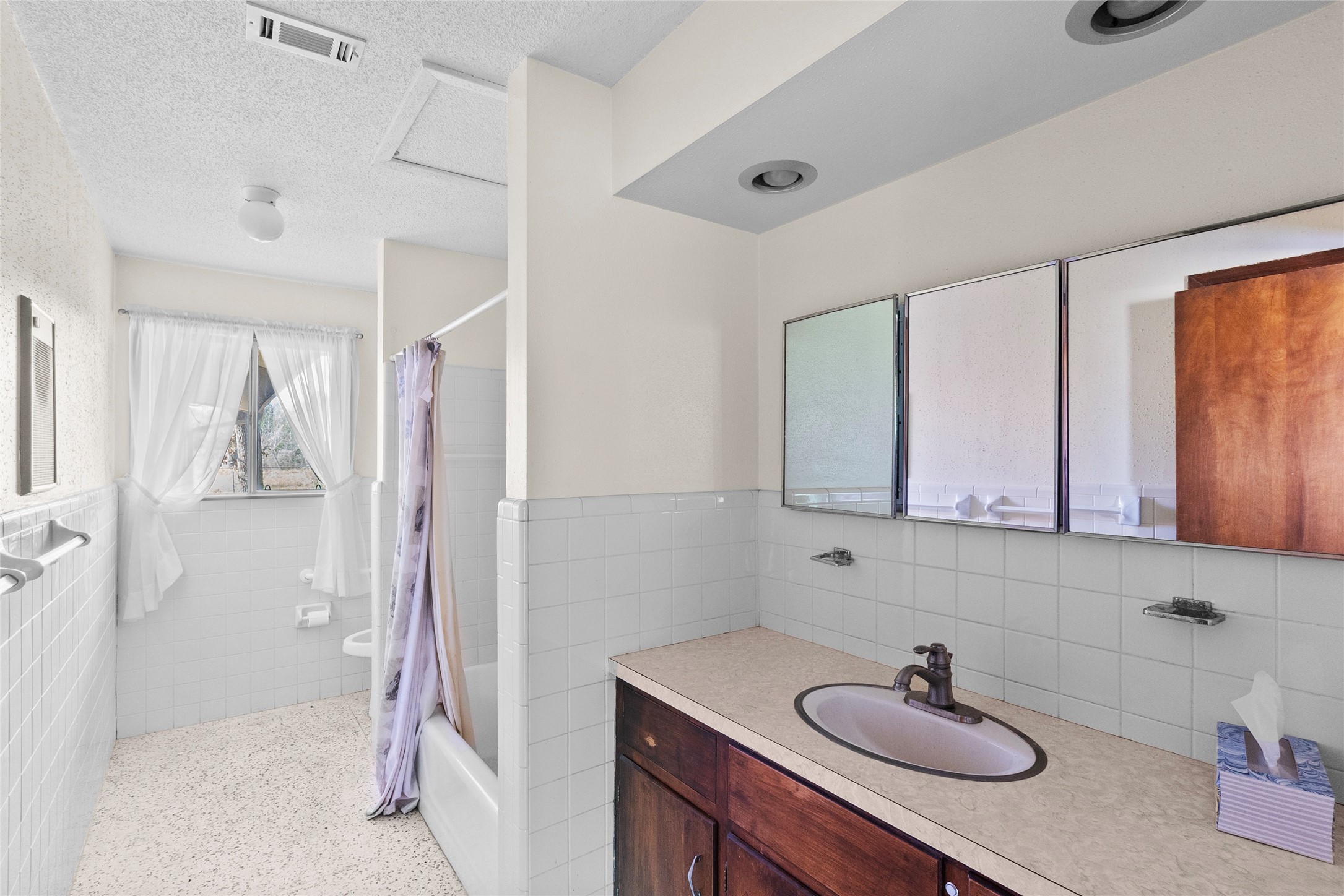 16121 Fm 2620 Road Bedias, TX 77831 - Photo 9 of 28 a bathroom with a sink and a mirror