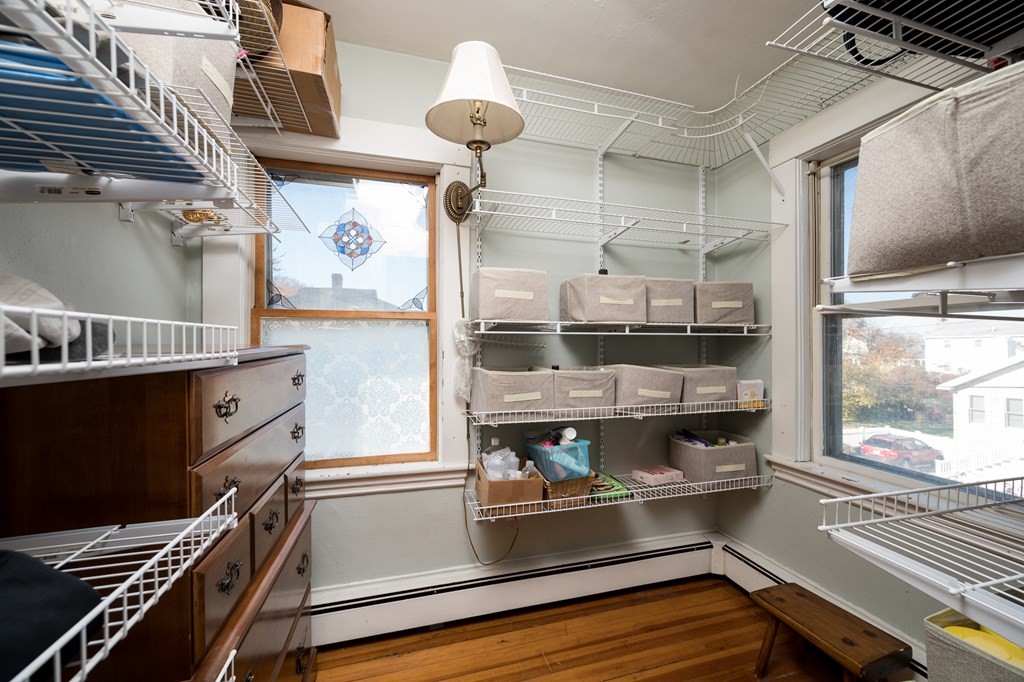 48 Bates Street Hull, MA 02045 - Photo 22 of 31 a kitchen with a refrigerator and a stove