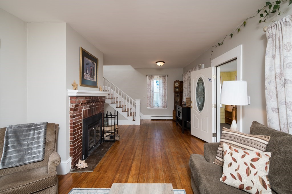 48 Bates Street Hull, MA 02045 - Photo 6 of 31 a view of living room with furniture and wooden floor