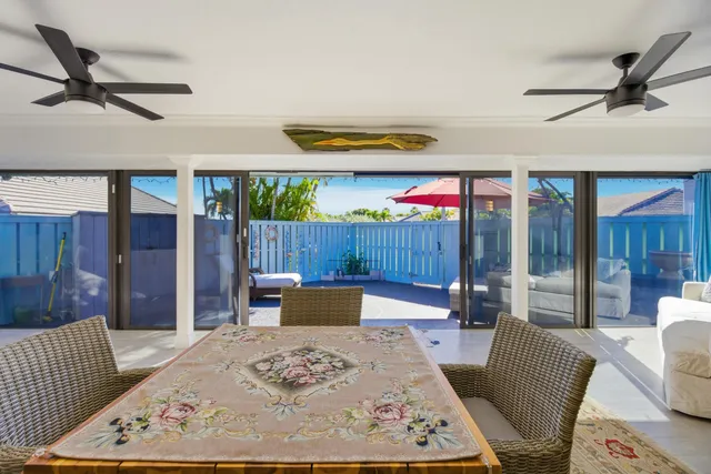 a kitchen with stainless steel appliances granite countertop a stove and a wooden floors