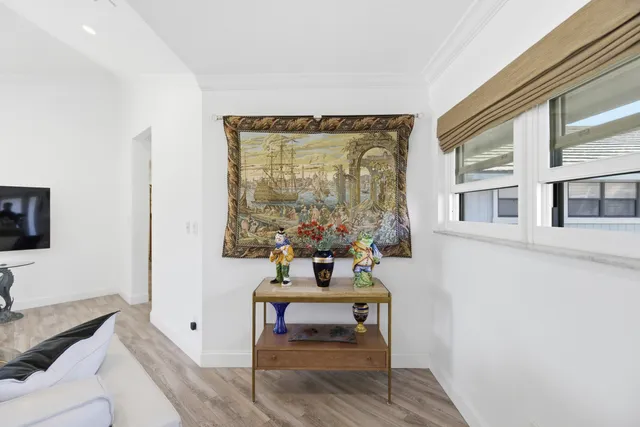 a room with furniture and wooden floor