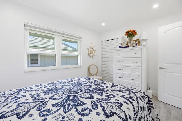 a utility room with closet dryer and washer