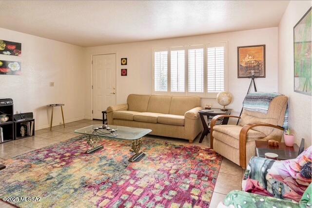 35 East Pastime Road Tucson, AZ 85705 - Photo 3 of 28 a living room with furniture or couch and a window