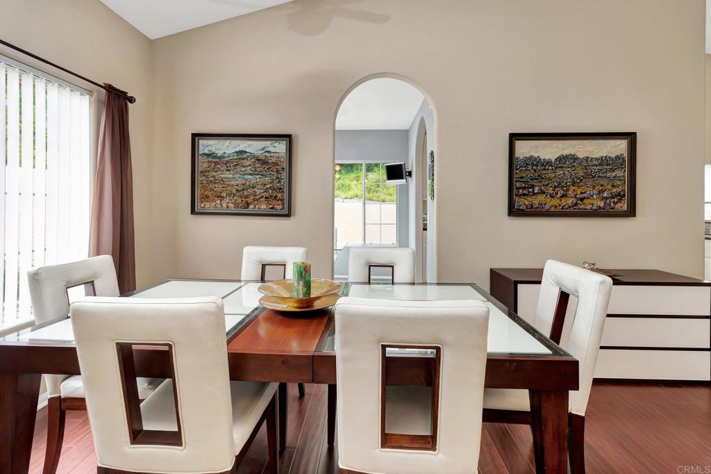 1205 Rancho Pacifica Place Vista, CA 92084 - Photo 11 of 42 a dining room with furniture and window